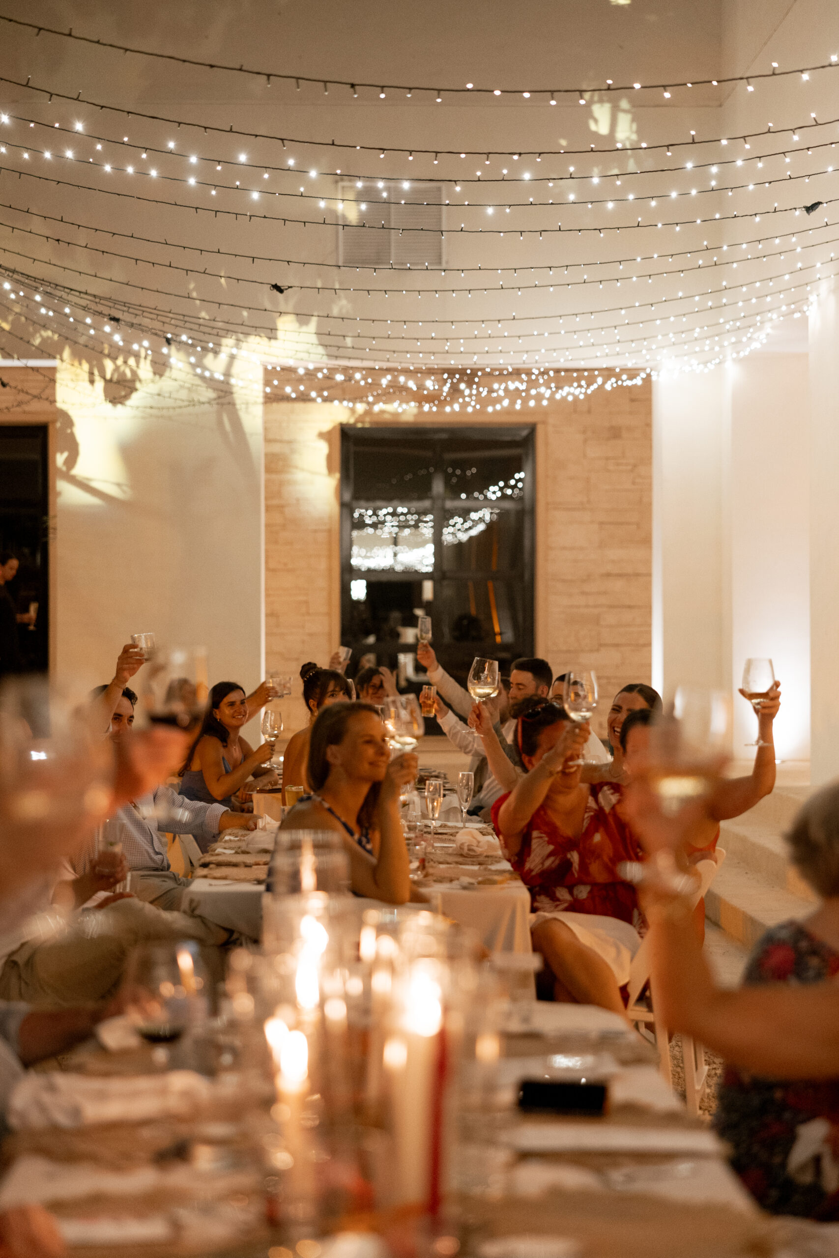 Elegant outdoor welcome dinner setup at destination wedding in Mexico